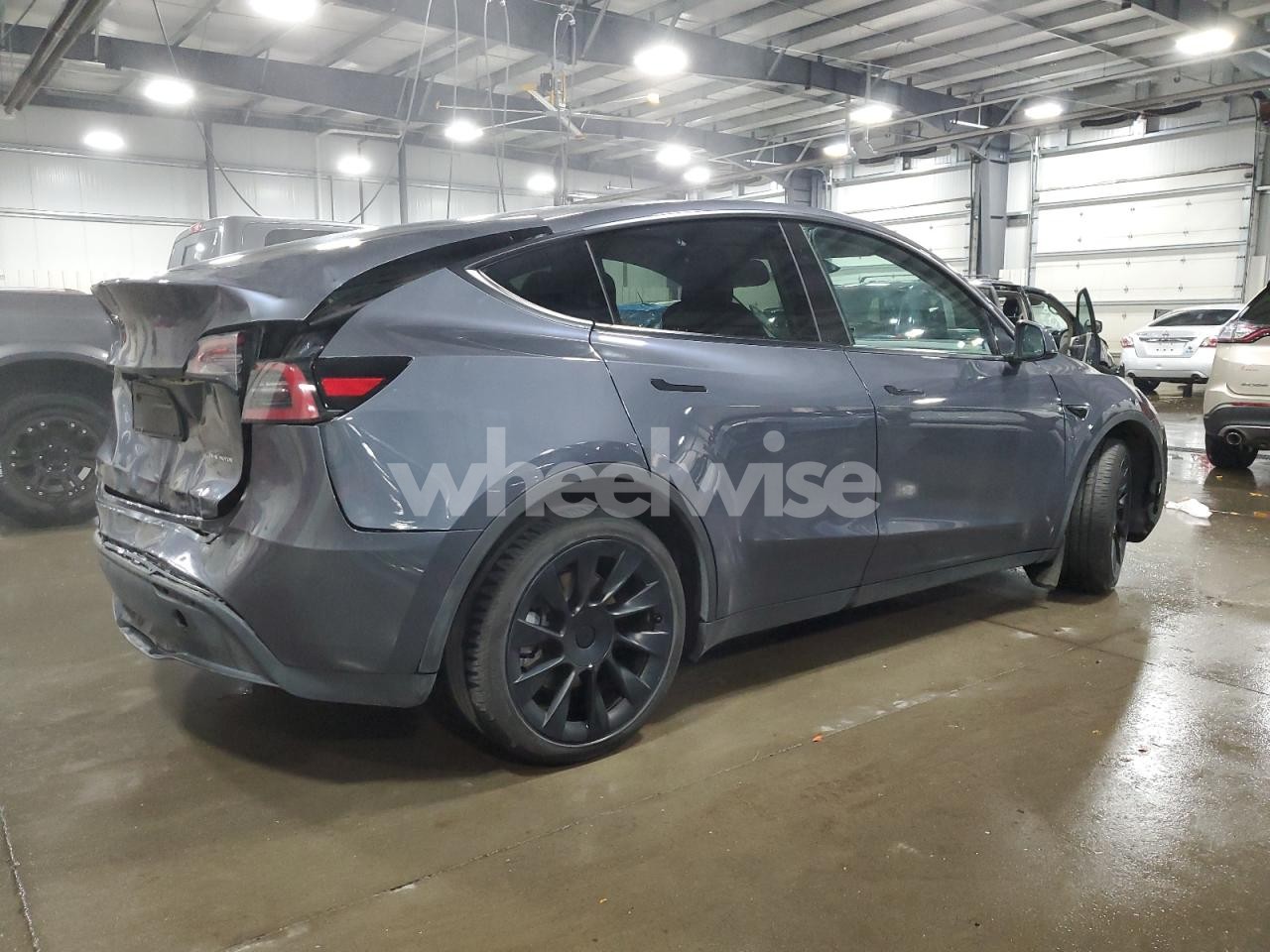Photo 3 of 2023 TESLA MODEL Y (VIN 7SAYGDEE2PF840709)