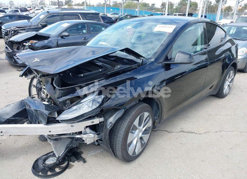 Photo 2 of 2023 Tesla Model Y AWD/LONG RANGE DUAL MOTOR ALL-WHEEL DRIVE (VIN 7SAYGDEE2PF863200)