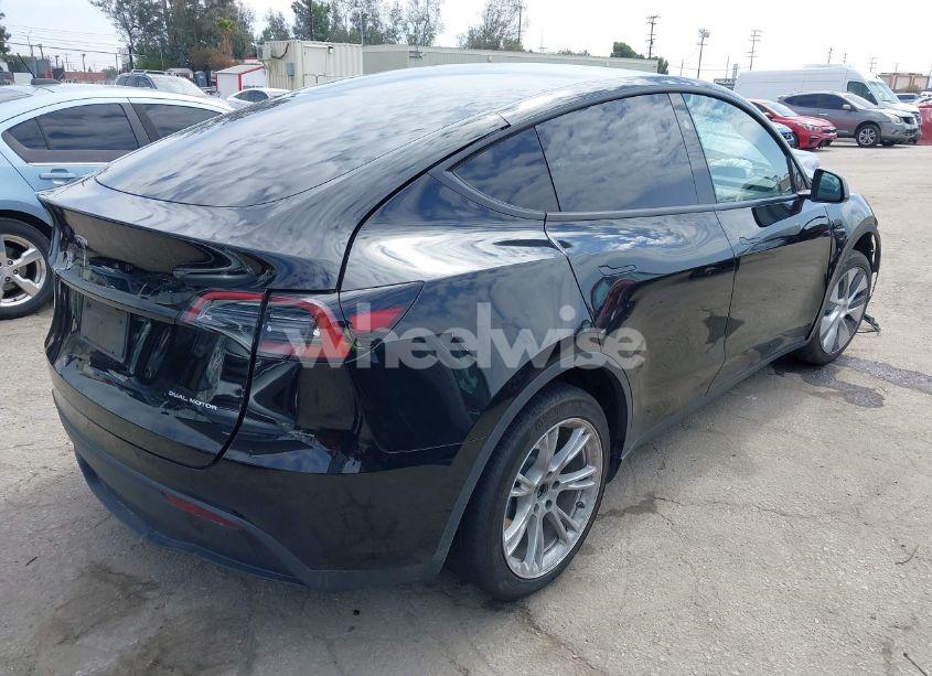 Photo 4 of 2023 Tesla Model Y AWD/LONG RANGE DUAL MOTOR ALL-WHEEL DRIVE (VIN 7SAYGDEE2PF863200)