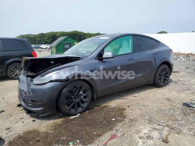 Photo 2 of 2023 TESLA MODEL Y (VIN 7SAYGDEE2PF894298)