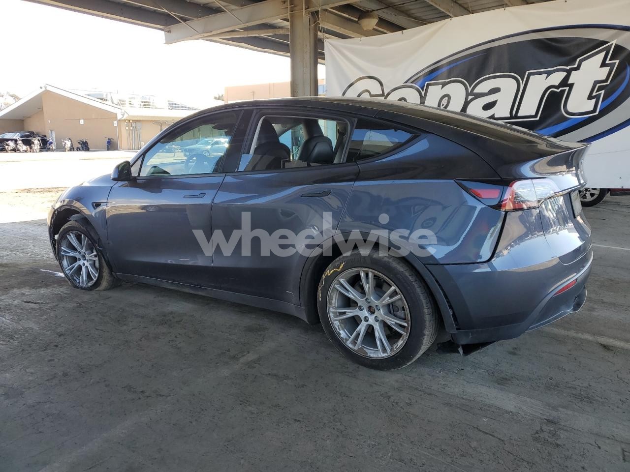 Photo 2 of 2023 TESLA MODEL Y (VIN 7SAYGDEE2PF928837)
