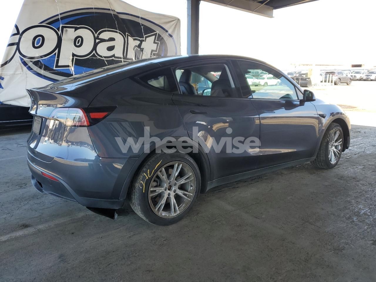 Photo 3 of 2023 TESLA MODEL Y (VIN 7SAYGDEE2PF928837)