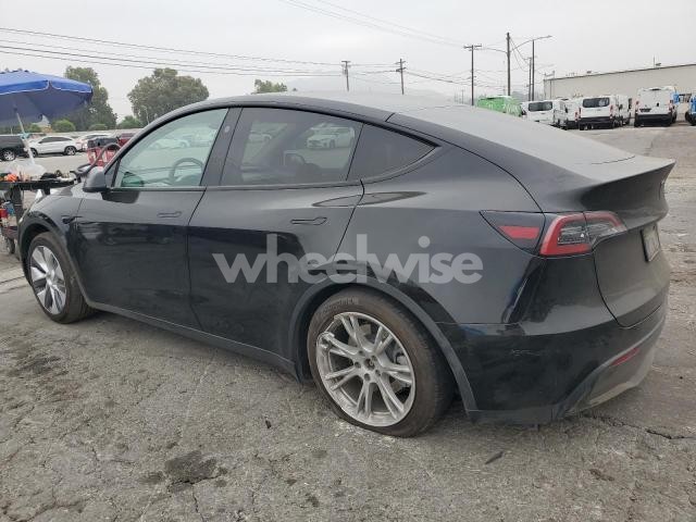 Photo 4 of 2023 TESLA MODEL Y (VIN 7SAYGDEE2PF941250)