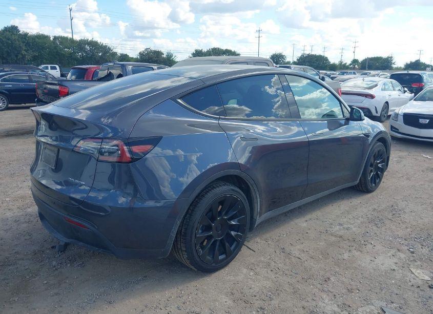 Photo 4 of 2023 Tesla Model Y AWD/LONG RANGE DUAL MOTOR ALL-WHEEL DRIVE (VIN 7SAYGDEE3PA050610)