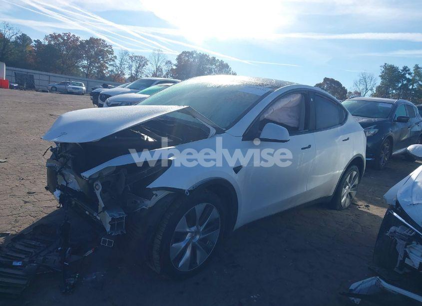 Photo 2 of 2023 Tesla Model Y AWD/LONG RANGE DUAL MOTOR ALL-WHEEL DRIVE (VIN 7SAYGDEE3PA130666)