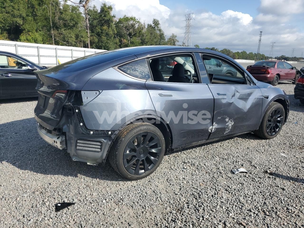 Photo 3 of 2023 TESLA MODEL Y (VIN 7SAYGDEE3PA204135)