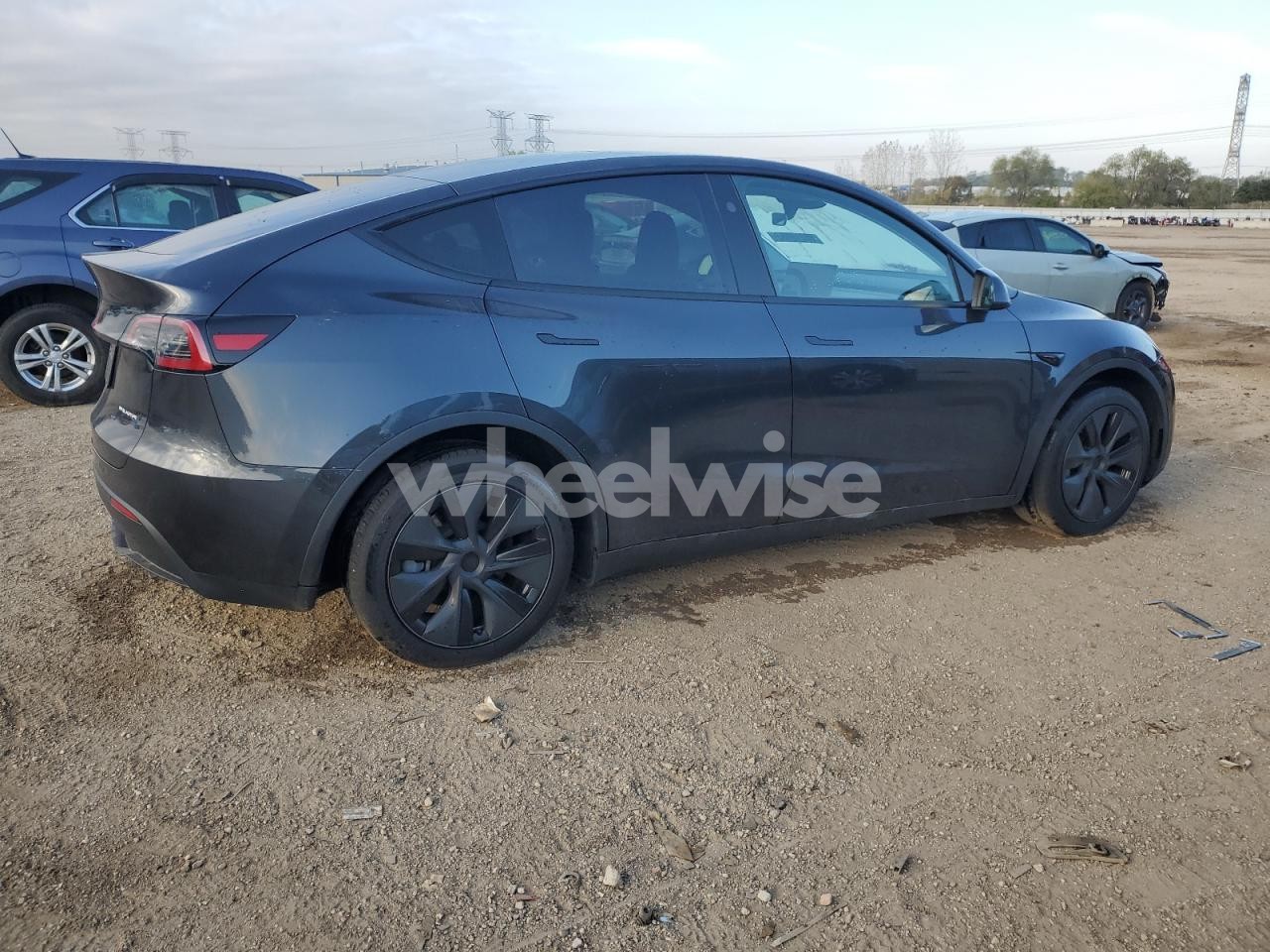 Photo 3 of 2025 TESLA MODEL Y (VIN 7SAYGDEE3SF284127)