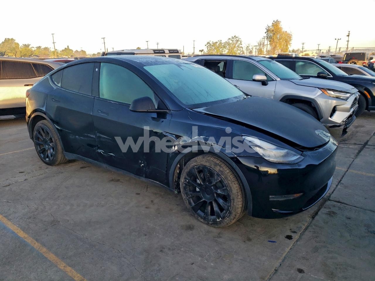 Photo 4 of 2022 TESLA MODEL Y (VIN 7SAYGDEE4NF440177)