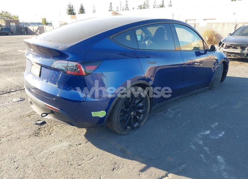 Photo 4 of 2023 Tesla Model Y AWD/LONG RANGE DUAL MOTOR ALL-WHEEL DRIVE (VIN 7SAYGDEE4PA035856)
