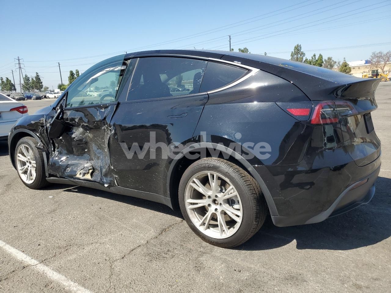 Photo 2 of 2023 TESLA MODEL Y (VIN 7SAYGDEE4PA098083)