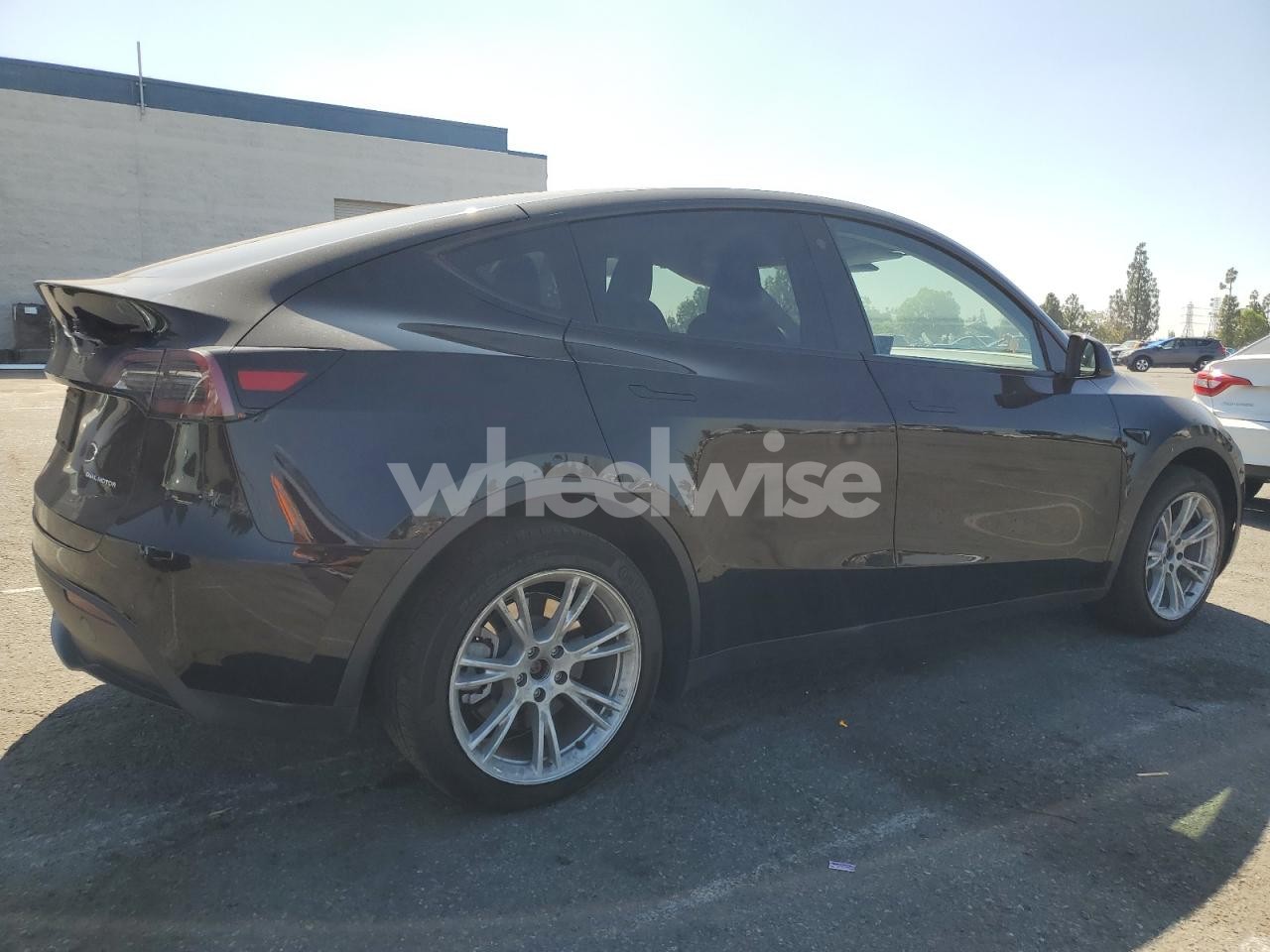 Photo 3 of 2023 TESLA MODEL Y (VIN 7SAYGDEE4PA098083)