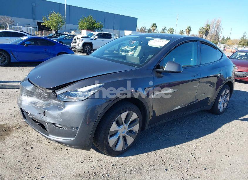 Photo 2 of 2023 Tesla Model Y AWD/LONG RANGE DUAL MOTOR ALL-WHEEL DRIVE (VIN 7SAYGDEE4PF587988)
