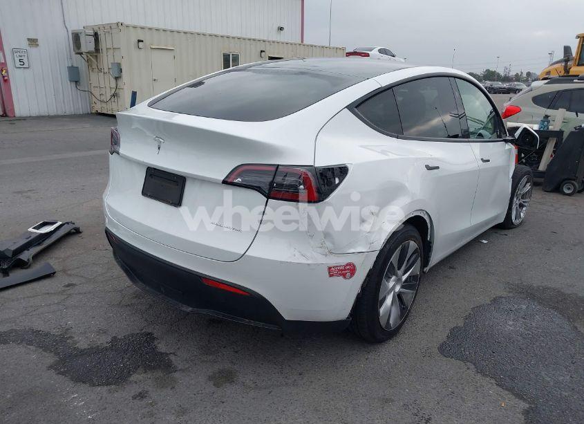 Photo 4 of 2023 Tesla Model Y AWD/LONG RANGE DUAL MOTOR ALL-WHEEL DRIVE (VIN 7SAYGDEE4PF807551)