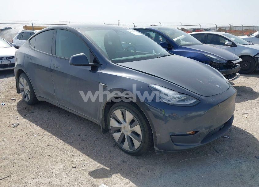 2023 Tesla Model Y AWD/LONG RANGE DUAL MOTOR ALL-WHEEL DRIVE (VIN 7SAYGDEE5PA035722) main photo