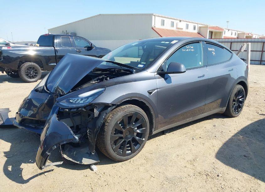 Photo 2 of 2023 Tesla Model Y AWD/LONG RANGE DUAL MOTOR ALL-WHEEL DRIVE (VIN 7SAYGDEE5PA047384)