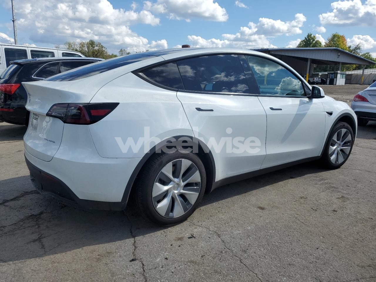 Photo 3 of 2023 TESLA MODEL Y (VIN 7SAYGDEE5PA166830)