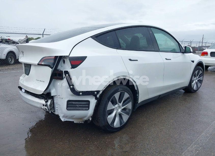 Photo 4 of 2023 Tesla Model Y AWD/LONG RANGE DUAL MOTOR ALL-WHEEL DRIVE (VIN 7SAYGDEE5PF712612)