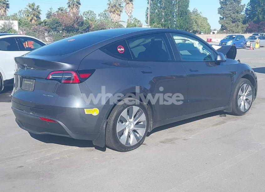 Photo 4 of 2022 Tesla Model Y LONG RANGE DUAL MOTOR ALL-WHEEL DRIVE (VIN 7SAYGDEE6NF344583)