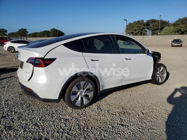 Photo 11 of 2023 TESLA MODEL Y (VIN 7SAYGDEE6PA080958)