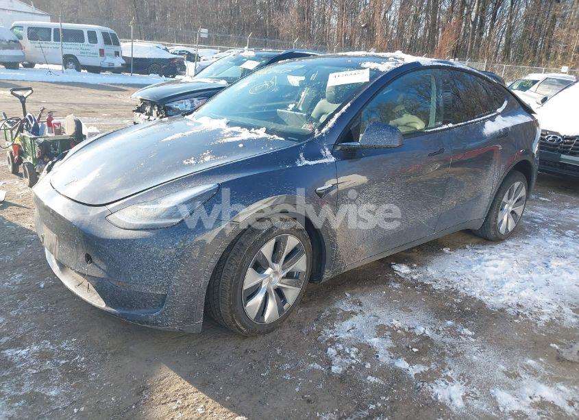 Photo 2 of 2023 Tesla Model Y AWD/LONG RANGE DUAL MOTOR ALL-WHEEL DRIVE (VIN 7SAYGDEE6PA081947)