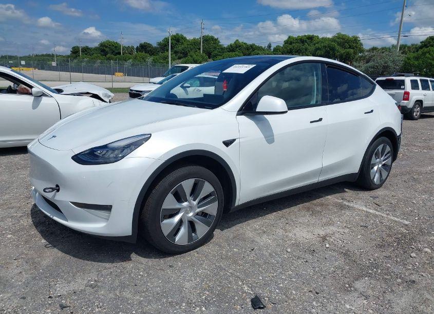 Photo 2 of 2023 Tesla Model Y AWD/LONG RANGE DUAL MOTOR ALL-WHEEL DRIVE (VIN 7SAYGDEE6PA128653)