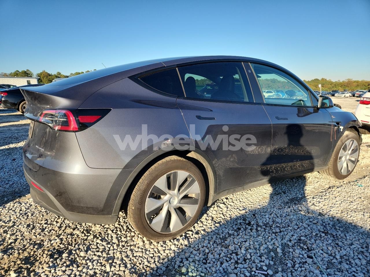 Photo 3 of 2023 TESLA MODEL Y (VIN 7SAYGDEE6PF669849)