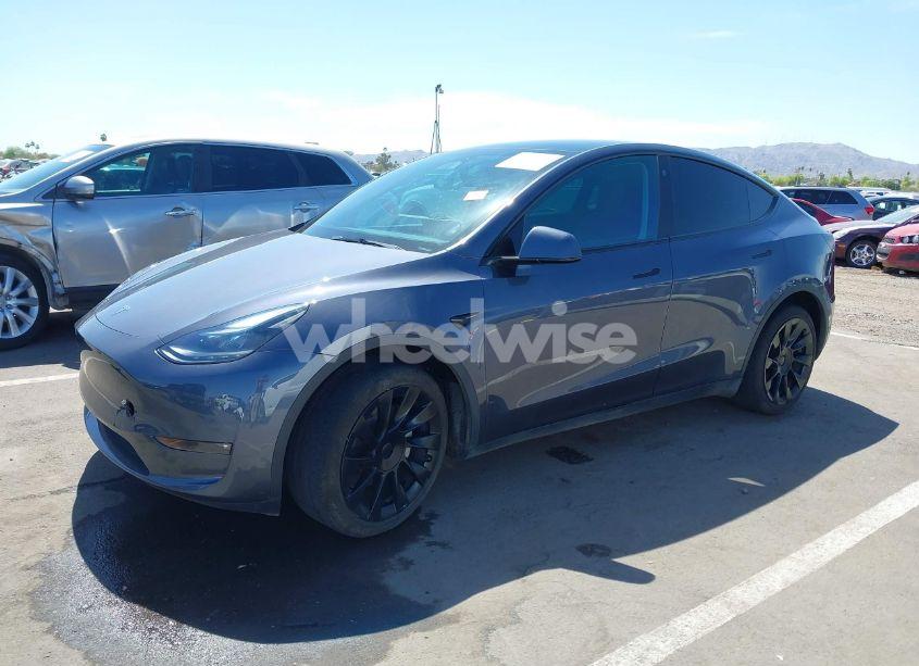 Photo 2 of 2023 Tesla Model Y AWD/LONG RANGE DUAL MOTOR ALL-WHEEL DRIVE (VIN 7SAYGDEE6PF691155)