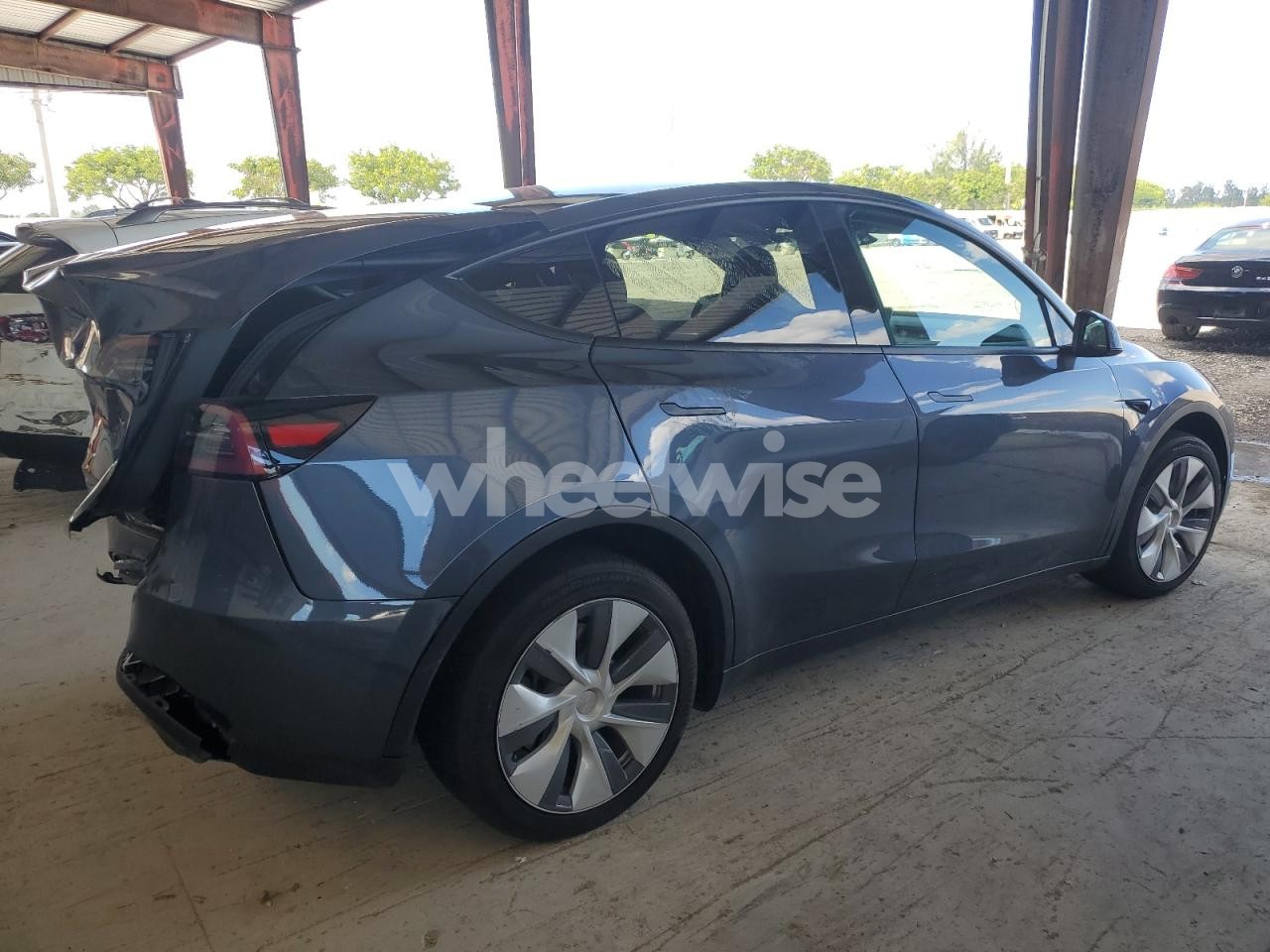 Photo 3 of 2023 TESLA MODEL Y (VIN 7SAYGDEE6PF866603)
