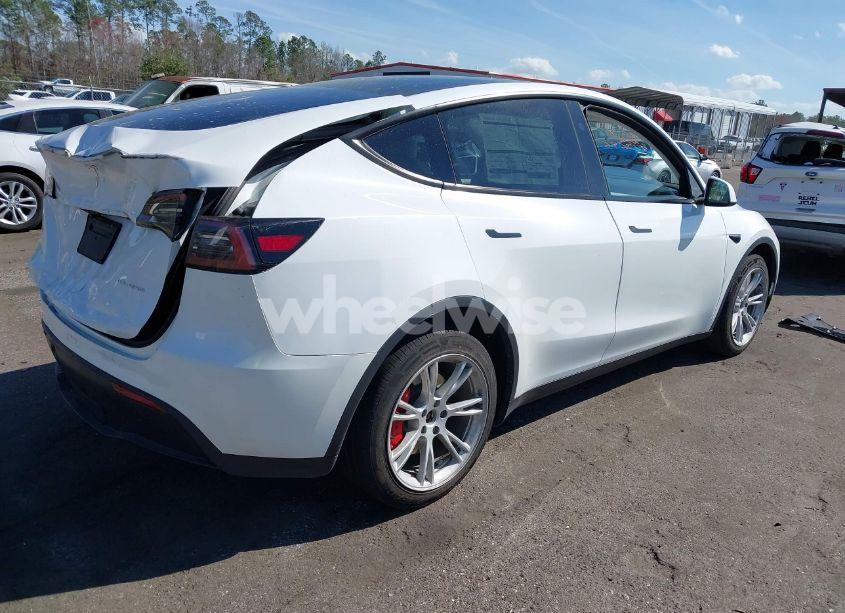 Photo 4 of 2023 Tesla Model Y AWD/LONG RANGE DUAL MOTOR ALL-WHEEL DRIVE (VIN 7SAYGDEE6PF873695)