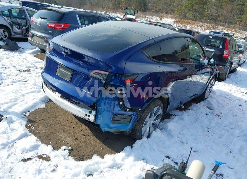 Photo 4 of 2023 Tesla Model Y AWD/LONG RANGE DUAL MOTOR ALL-WHEEL DRIVE (VIN 7SAYGDEE6PF890254)