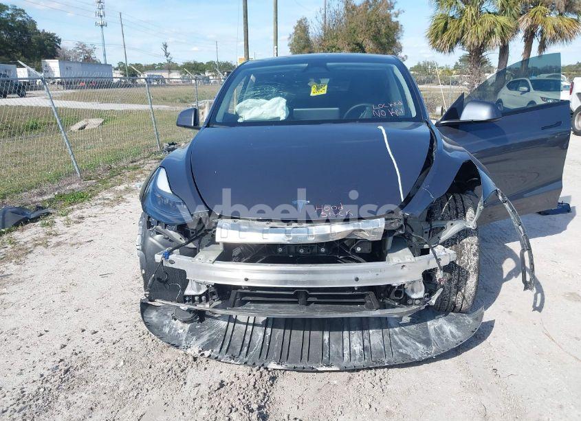 Photo 6 of 2023 Tesla Model Y AWD/LONG RANGE DUAL MOTOR ALL-WHEEL DRIVE (VIN 7SAYGDEE6PF942921)