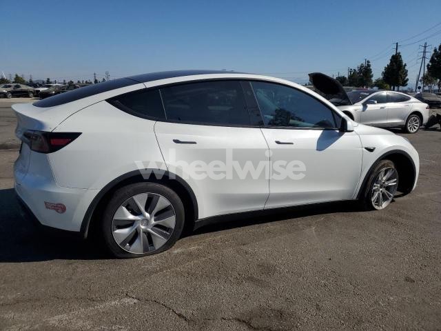 Photo 2 of 2024 TESLA MODEL Y (VIN 7SAYGDEE6RF083400)