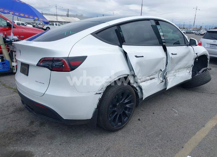 Photo 4 of 2023 Tesla Model Y AWD/LONG RANGE DUAL MOTOR ALL-WHEEL DRIVE (VIN 7SAYGDEE7PA023295)