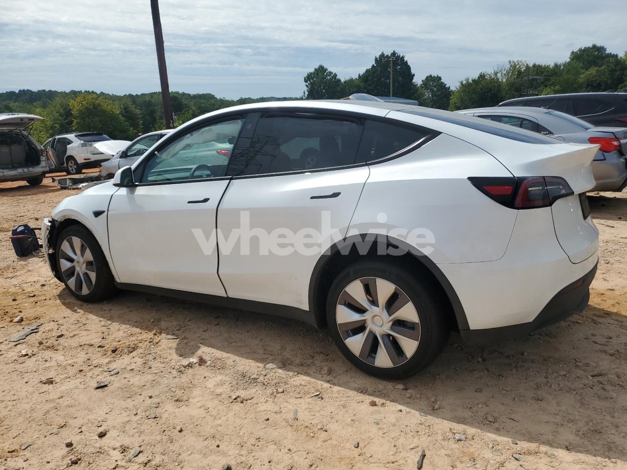 Photo 2 of 2023 TESLA MODEL Y (VIN 7SAYGDEE7PA061402)