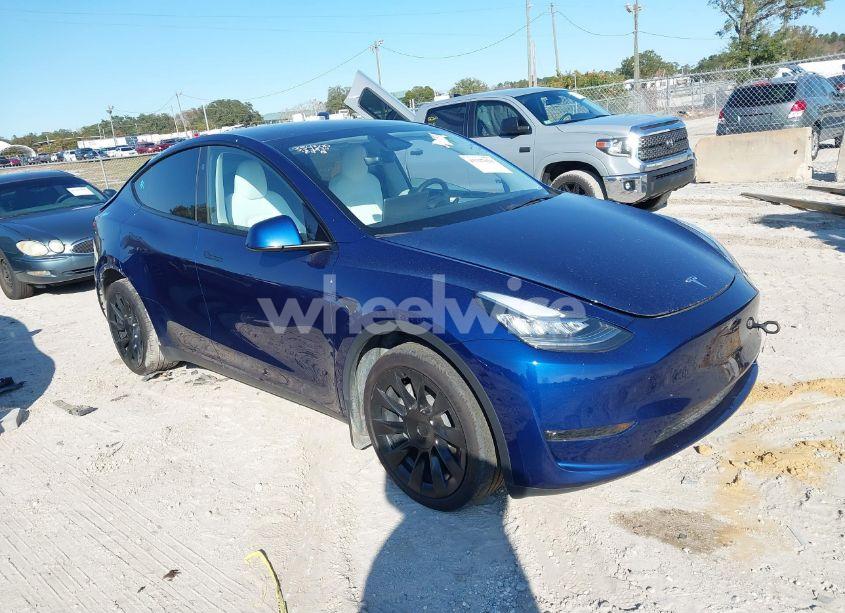 2023 Tesla Model Y AWD/LONG RANGE DUAL MOTOR ALL-WHEEL DRIVE (VIN 7SAYGDEE7PA143890) main photo