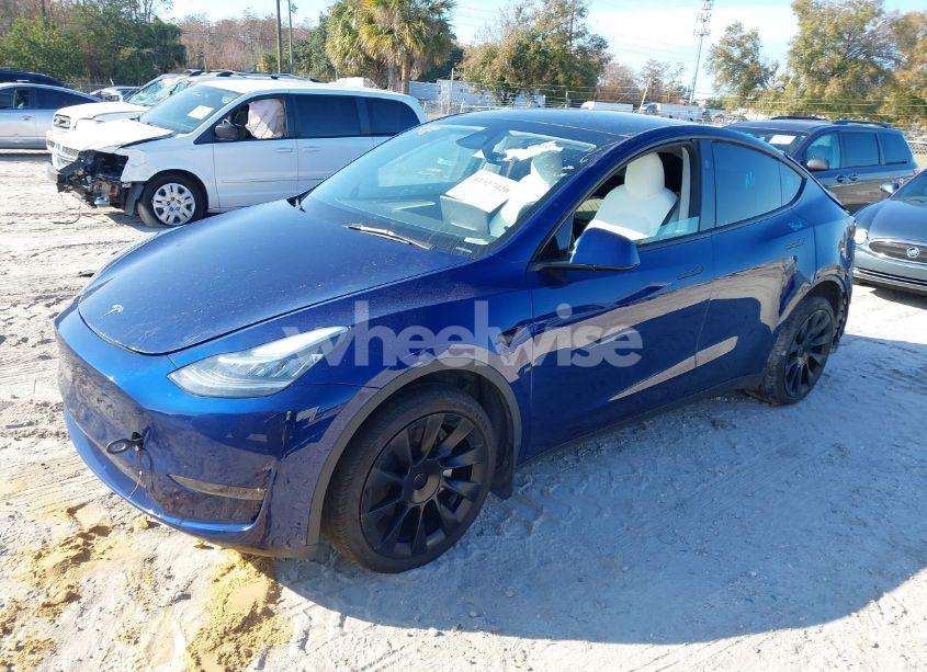 Photo 2 of 2023 Tesla Model Y AWD/LONG RANGE DUAL MOTOR ALL-WHEEL DRIVE (VIN 7SAYGDEE7PA143890)