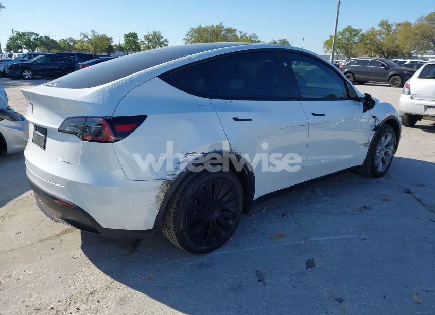 Photo 4 of 2023 Tesla Model Y AWD/LONG RANGE DUAL MOTOR ALL-WHEEL DRIVE (VIN 7SAYGDEE7PA199845)