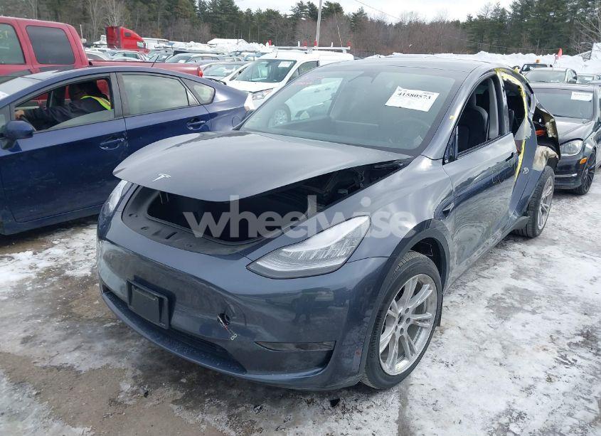 Photo 2 of 2023 Tesla Model Y (VIN 7SAYGDEE7PF602709)