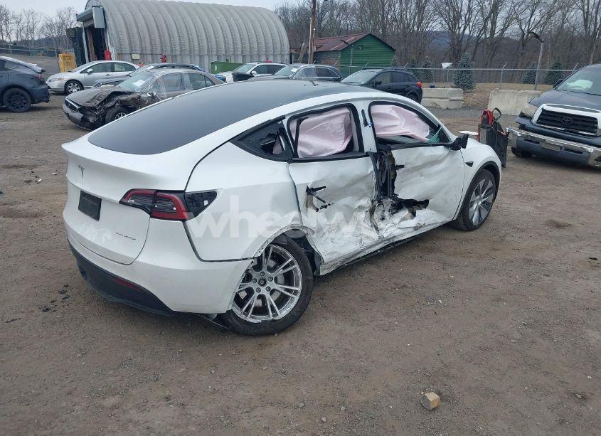 Photo 4 of 2023 Tesla Model Y AWD/LONG RANGE DUAL MOTOR ALL-WHEEL DRIVE (VIN 7SAYGDEE7PF759107)