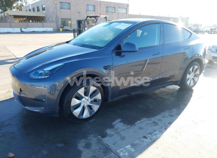 Photo 2 of 2023 Tesla Model Y (VIN 7SAYGDEE7PF980156)
