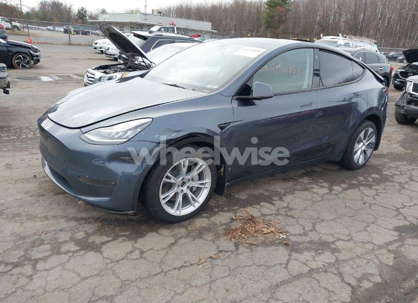 Photo 2 of 2023 Tesla Model Y AWD/LONG RANGE DUAL MOTOR ALL-WHEEL DRIVE (VIN 7SAYGDEE8PA057777)