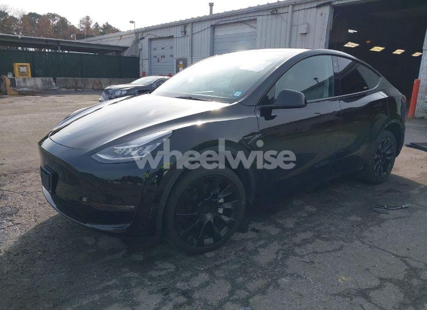 Photo 2 of 2023 Tesla Model Y AWD/LONG RANGE DUAL MOTOR ALL-WHEEL DRIVE (VIN 7SAYGDEE8PA127763)