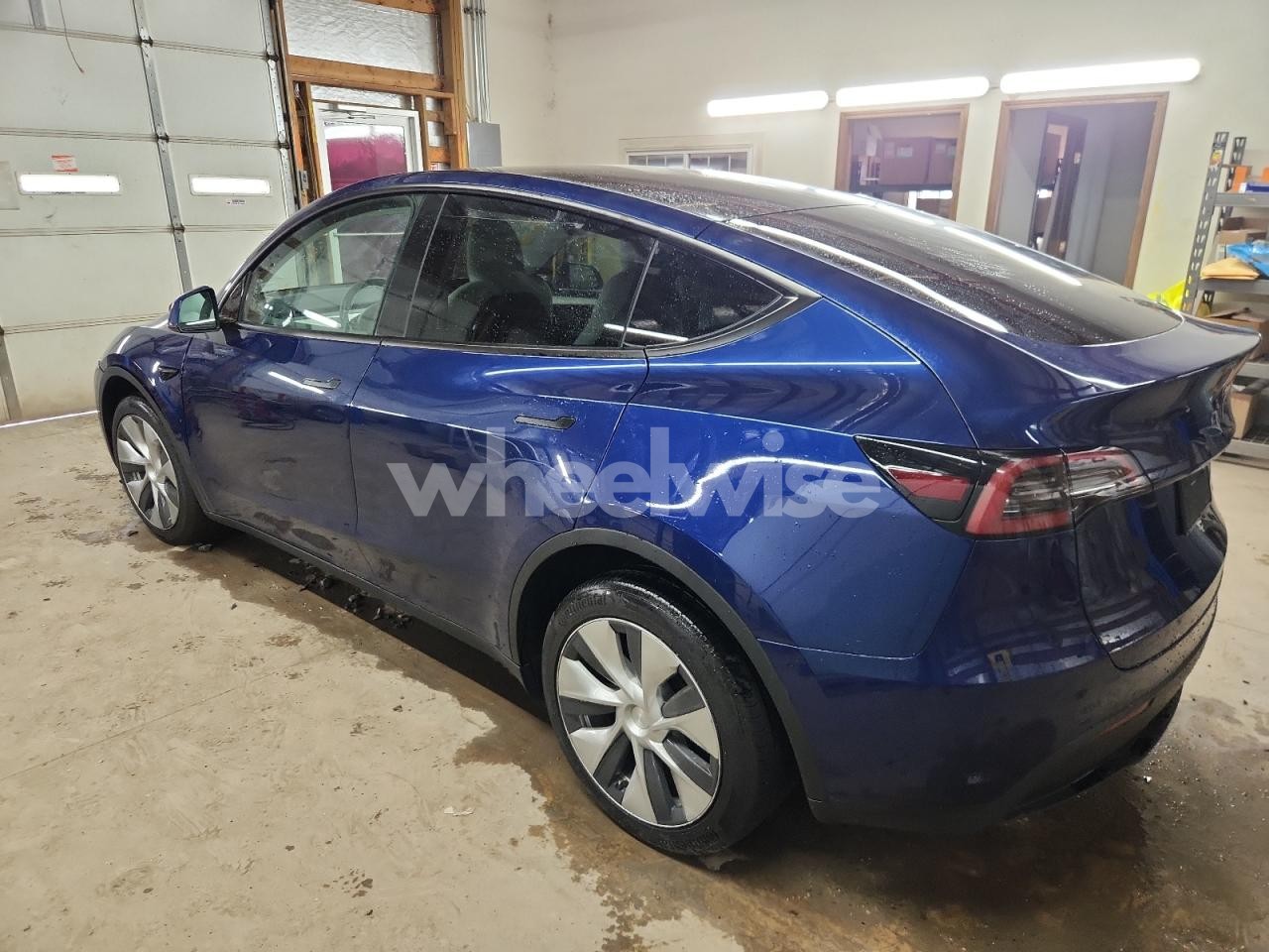 Photo 2 of 2023 TESLA MODEL Y (VIN 7SAYGDEE8PF607546)