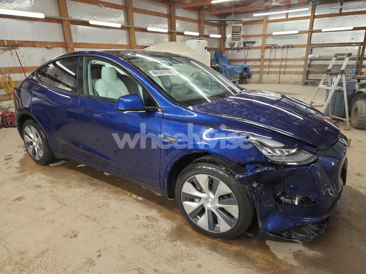 Photo 4 of 2023 TESLA MODEL Y (VIN 7SAYGDEE8PF607546)