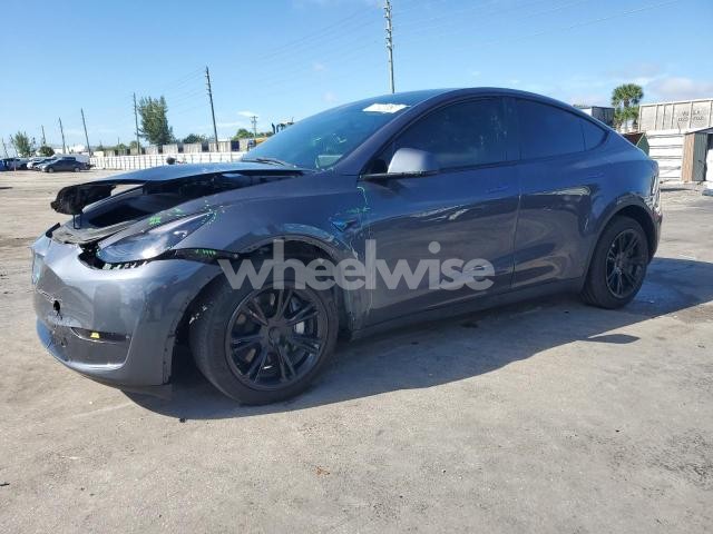 Photo 10 of 2023 TESLA MODEL Y (VIN 7SAYGDEE8PF699998)
