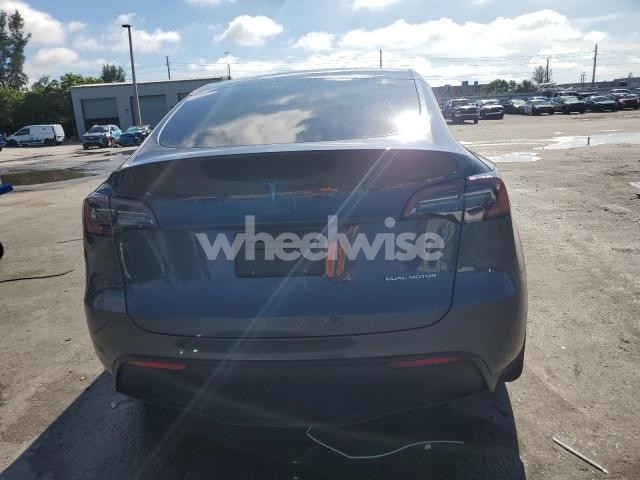Photo 4 of 2023 TESLA MODEL Y (VIN 7SAYGDEE8PF699998)