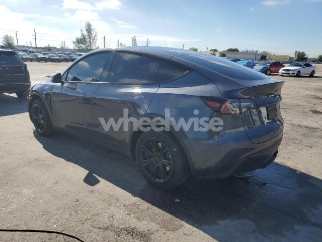 Photo 5 of 2023 TESLA MODEL Y (VIN 7SAYGDEE8PF699998)