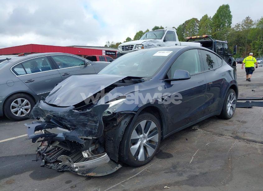 Photo 2 of 2023 Tesla Model Y AWD/LONG RANGE DUAL MOTOR ALL-WHEEL DRIVE (VIN 7SAYGDEE8PF707310)