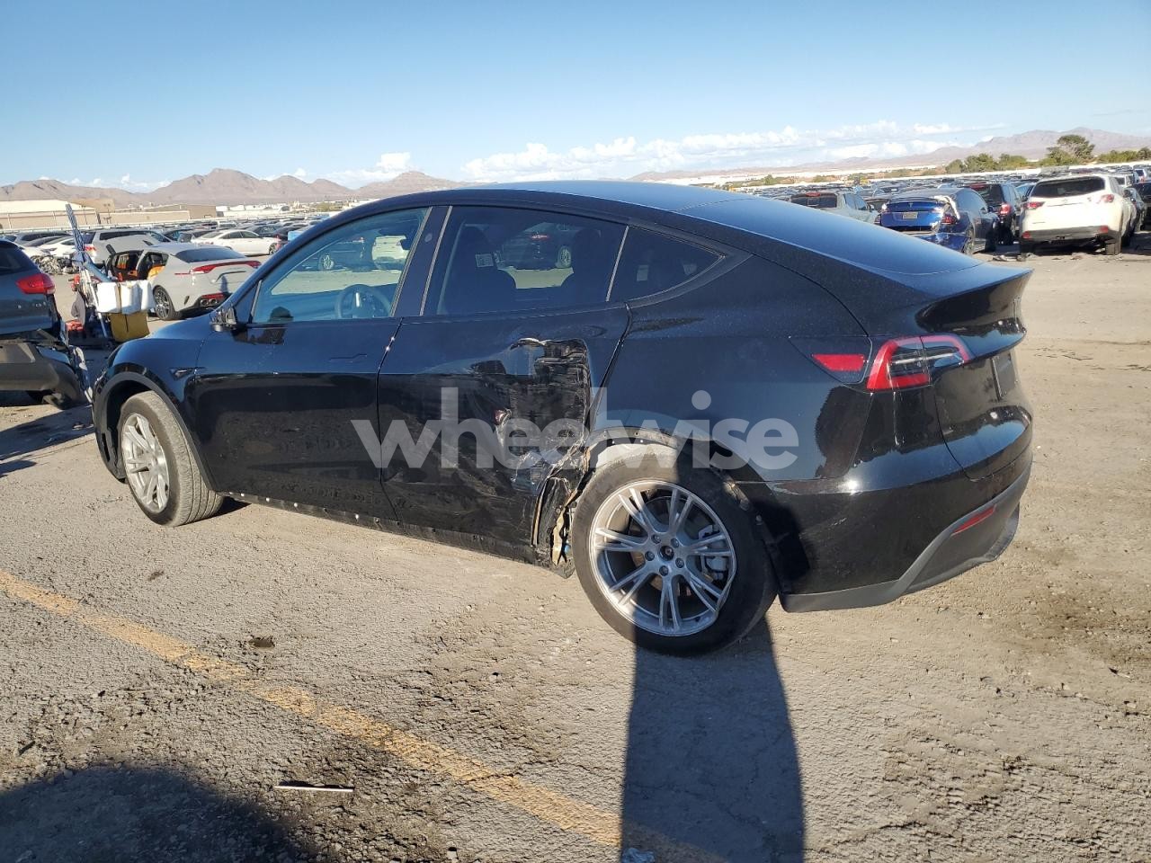 Photo 2 of 2023 TESLA MODEL Y (VIN 7SAYGDEE8PF898775)