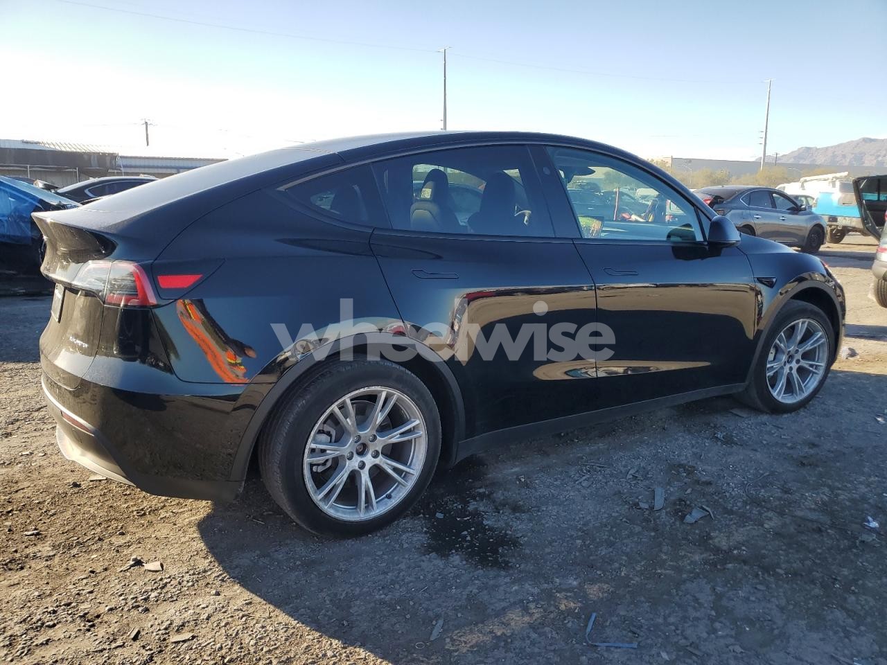 Photo 3 of 2023 TESLA MODEL Y (VIN 7SAYGDEE8PF898775)